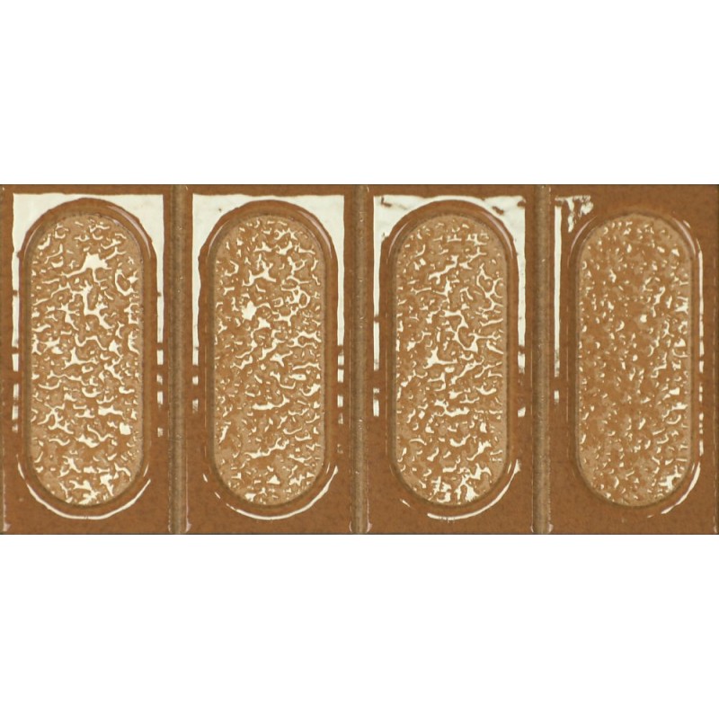 Porcelánico Esclat de Dune en color Mandarina, acabado brillo, relieve ovalado, formato 11,5x23,1 cm