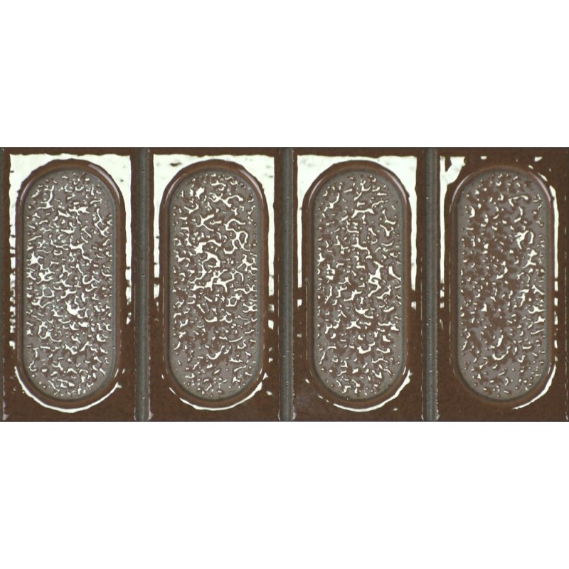 Porcelánico Esclat de Dune en color Xocolata, acabado brillo, relieve ovalado, formato 11,5x23,1 cm