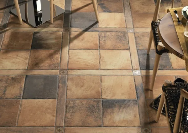 Ambiente con azulejos efecto barro en tonos cálidos, colección Tech land de Natucer