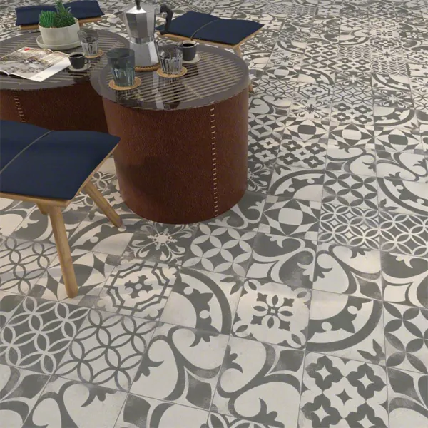 Ambiente con azulejos efecto cemento en tonos neutros, colección Nassau de Vives