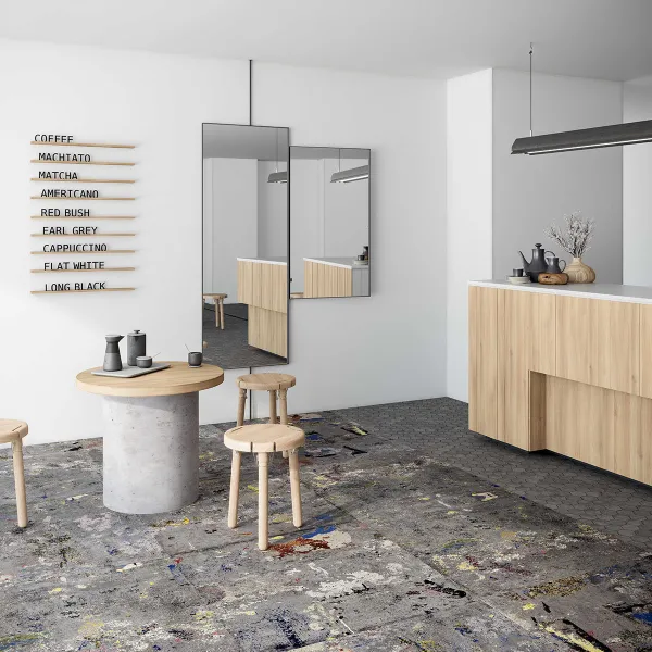 Ambiente con azulejos efecto cemento en tonos neutros, colección Werkbund de Land