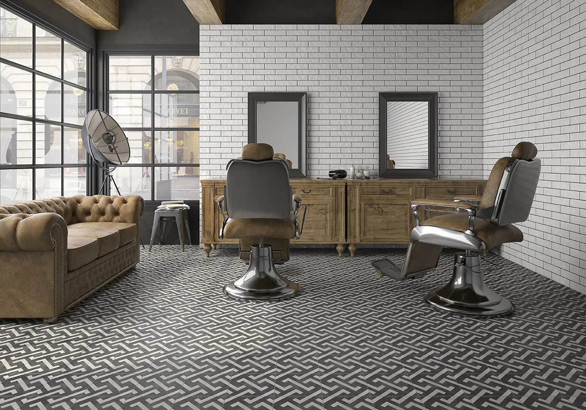 Ambiente con azulejos efecto hidráulico en tonos neutros, colección Art de Pamesa
