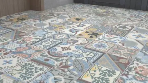 Ambiente con azulejos efecto hidráulico en tonos fríos, colección Bel histoire de Revoir Paris