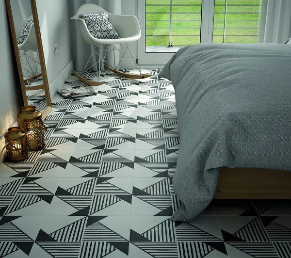 Ambiente con azulejos efecto hidráulico en tonos fríos, colección Caprice de Equipe