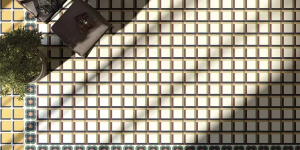 Ambiente con azulejos efecto hidráulico en tonos cálidos, colección Surf de Vives