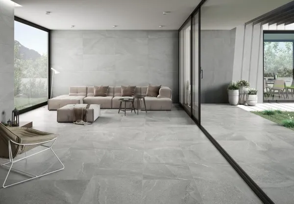 Ambiente con azulejos efecto piedra en tonos neutros, colección Boston de Proconcept