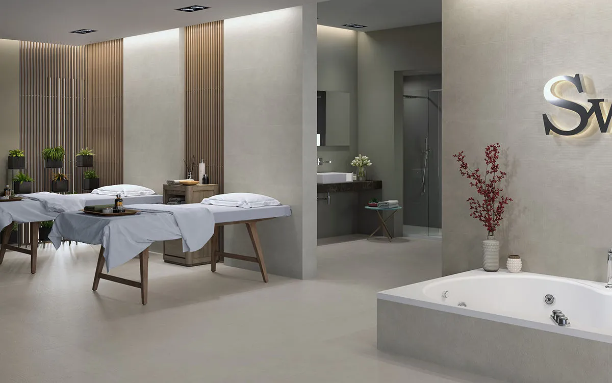 Baño con azulejos en tonos neutros