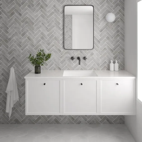 Baño con azulejos efecto barro en tonos neutros, colección Coco de Equipe