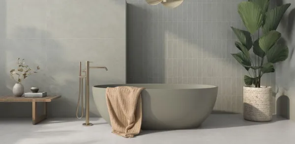 Baño con azulejos efecto barro en tonos neutros, colección Zero de Vives