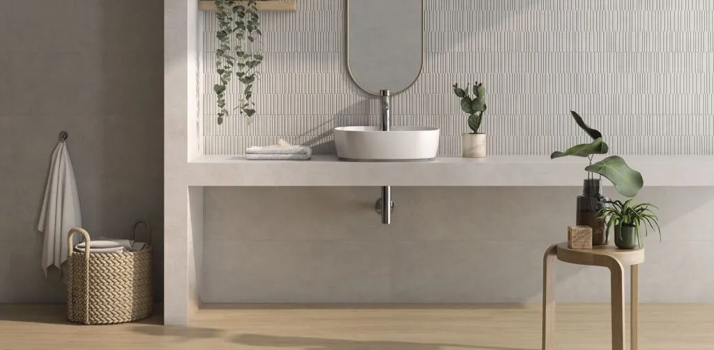 Baño con azulejos efecto barro, colección Zero de Vives