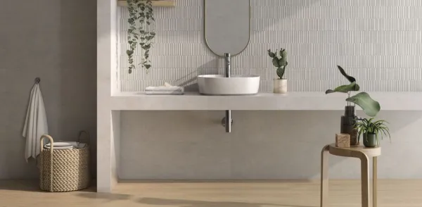 Baño con azulejos efecto barro, colección Zero de Vives