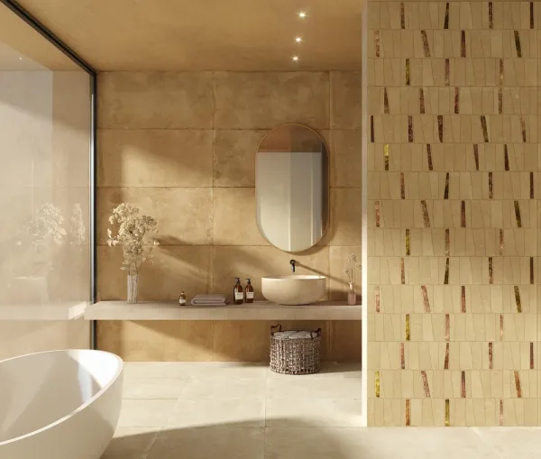 Baño con azulejos efecto barro en tonos cálidos, colección Zest de Aparici