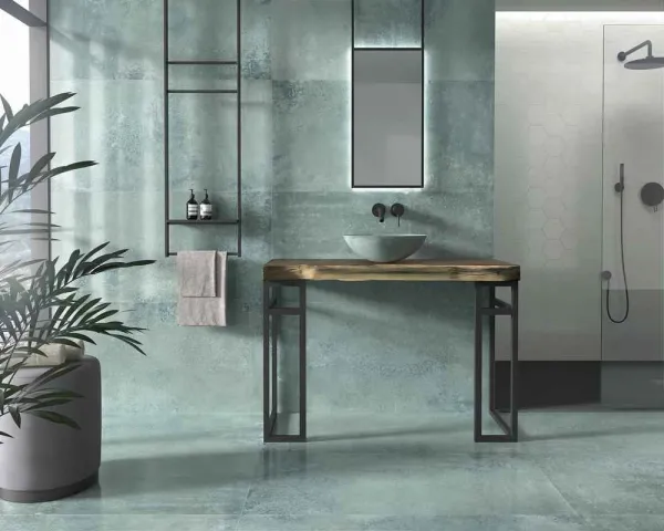 Baño con azulejos efecto botánico en tonos fríos, colección Magnet de Dune