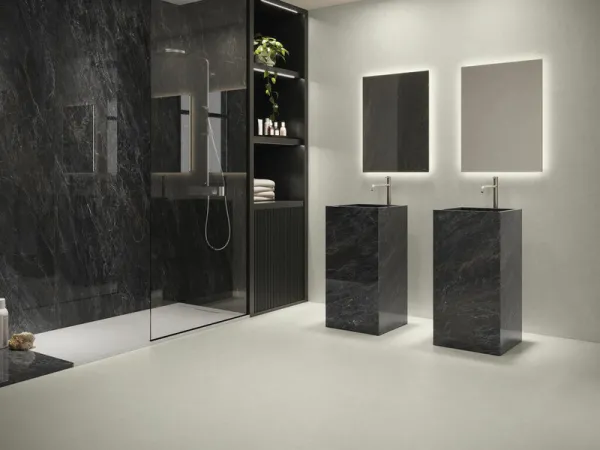 Baño con azulejos efecto cemento en tonos neutros, colección Acron de Cifre