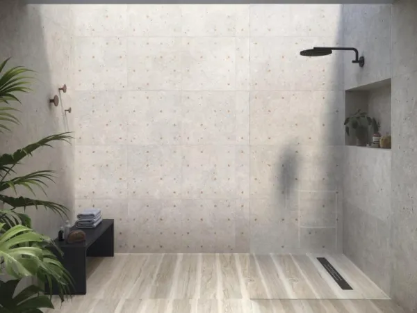 Baño con azulejos efecto cemento en tonos neutros, colección Ama de Ape