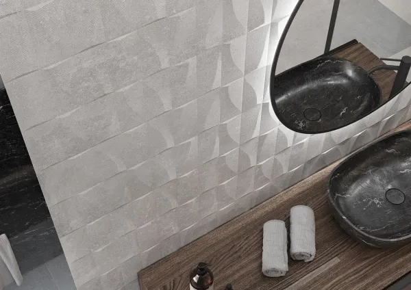 Baño con azulejos efecto cemento en tonos neutros, colección Arduin de Metropol