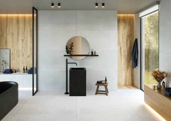 Baño con azulejos efecto cemento en tonos neutros, colección Arduin de Metropol