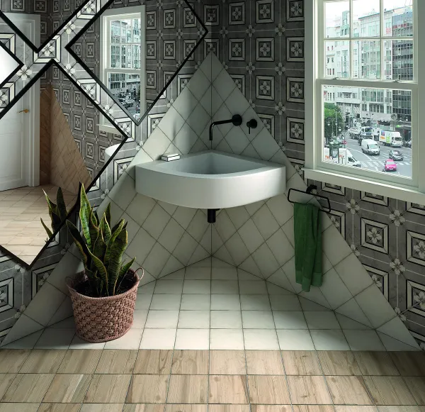 Baño con azulejos efecto cemento en tonos neutros, colección Art nouveau de Equipe