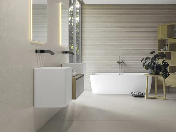 Baño con azulejos efecto cemento en tonos neutros, colección Borneo de Cifre