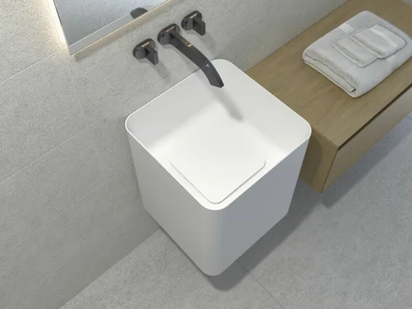 Baño con azulejos efecto cemento en tonos neutros, colección Borneo de Cifre