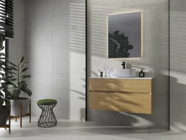 Baño con azulejos efecto cemento en tonos neutros, colección Borneo de Cifre
