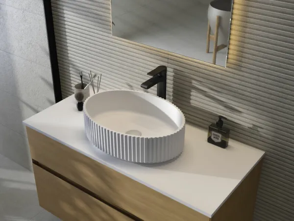 Baño con azulejos efecto cemento en tonos neutros, colección Borneo de Cifre
