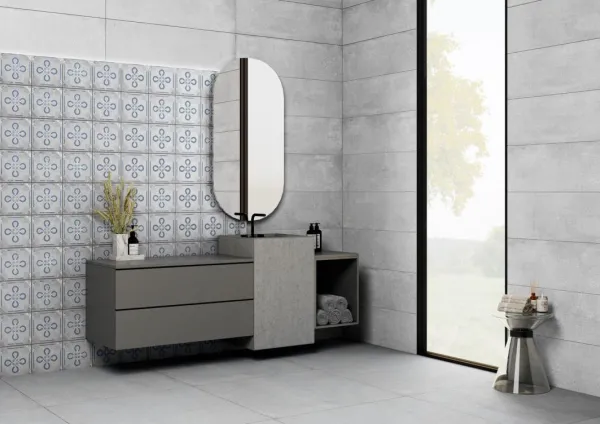 Baño con azulejos efecto cemento en tonos neutros, colección Boulevard de Ibero Casa Infinita