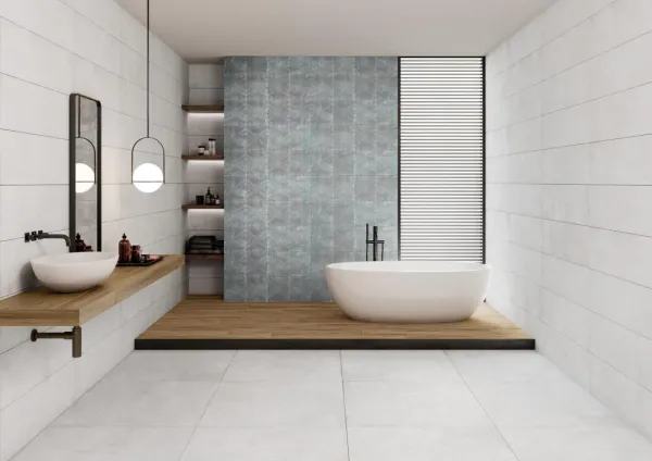Baño con azulejos efecto cemento en tonos neutros, colección Boulevard de Ibero Casa Infinita
