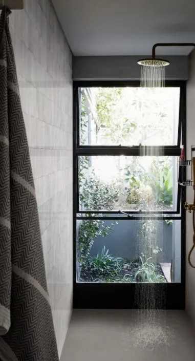 Baño con azulejos efecto cemento en tonos neutros, colección Cementum de Marazzi