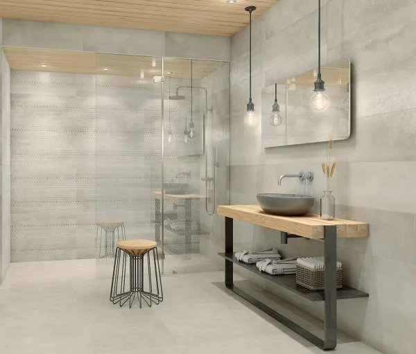 Baño con azulejos efecto cemento en tonos neutros, colección Channel de TAU ceràmica