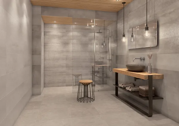 Baño con azulejos efecto cemento, colección Channel de TAU ceràmica