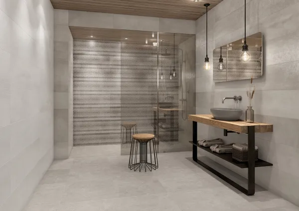 Baño con azulejos efecto cemento en tonos neutros, colección Channel de TAU ceràmica