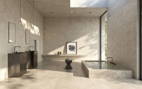 Baño con azulejos efecto cemento en tonos cálidos, colección Charme de Peronda