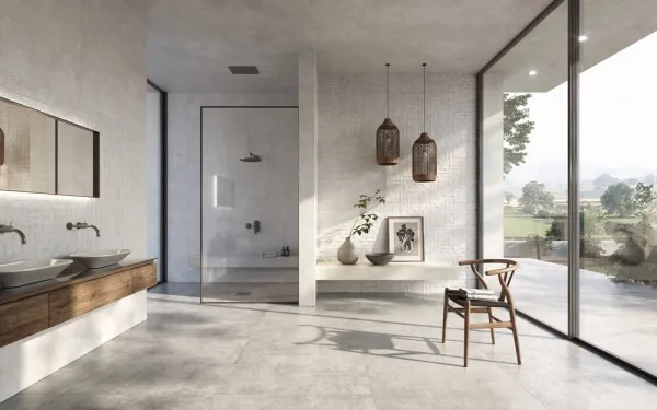 Baño con azulejos efecto cemento en tonos neutros, colección Charme de Peronda