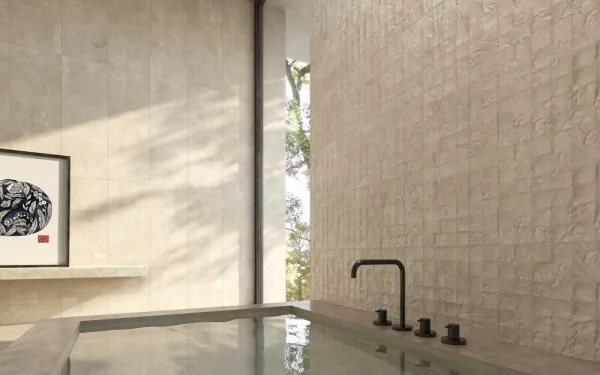 Baño con azulejos efecto cemento en tonos cálidos, colección Charme de Peronda