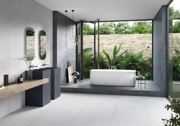 Baño con azulejos efecto cemento, colección Chrome de Metropol