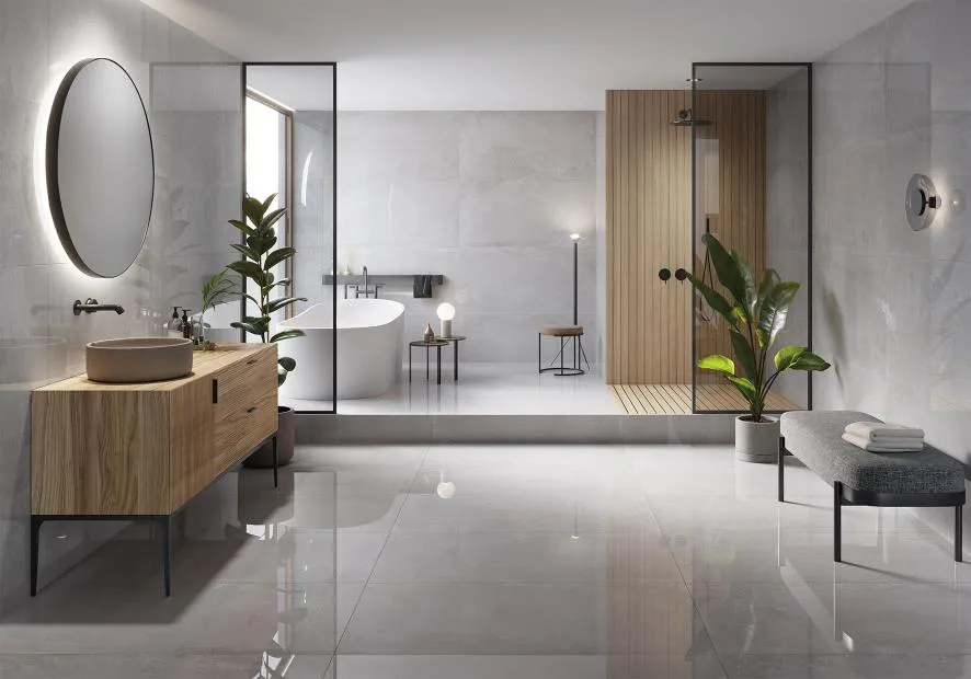 Baño con azulejos efecto cemento en tonos neutros, colección Chrome de Metropol