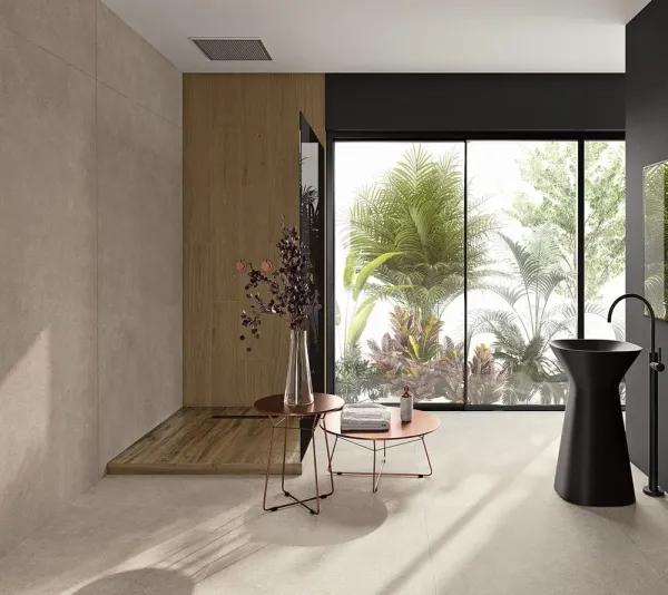 Baño con azulejos efecto cemento en tonos cálidos, colección Clunia de Durstone