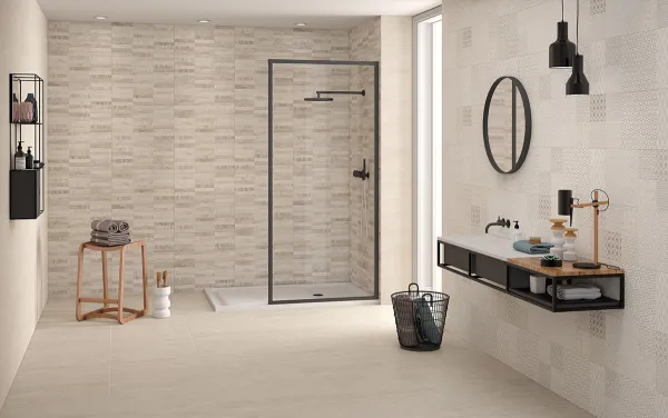 Baño con azulejos efecto cemento en tonos cálidos, colección Concept de Colorker