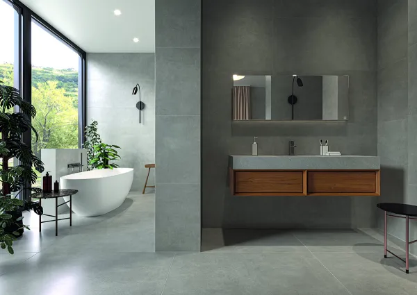 Baño con azulejos efecto cemento en tonos neutros, colección Cricket de Cifre
