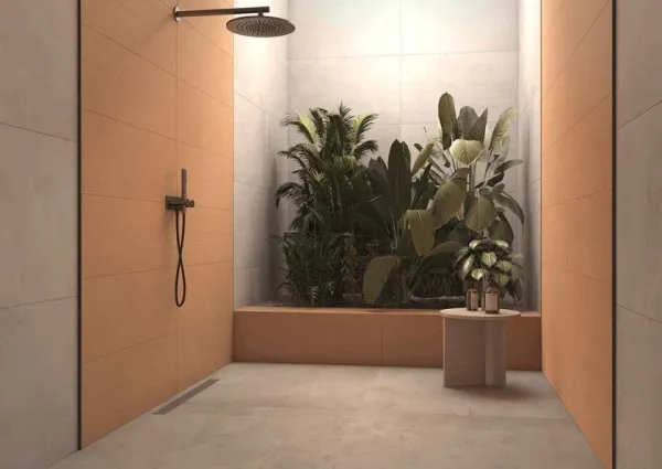 Baño con azulejos efecto cemento en tonos cálidos, colección Cute de TAU ceràmica