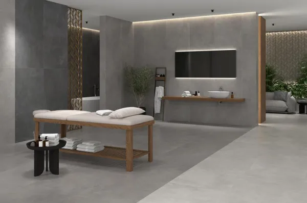 Baño con azulejos efecto cemento en tonos neutros, colección Elementi de STN