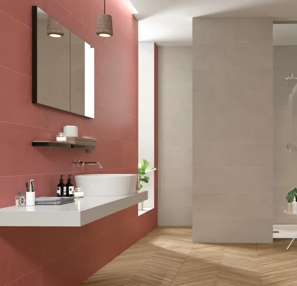 Baño con azulejos efecto cemento en tonos cálidos, colección Impulse de Colorker