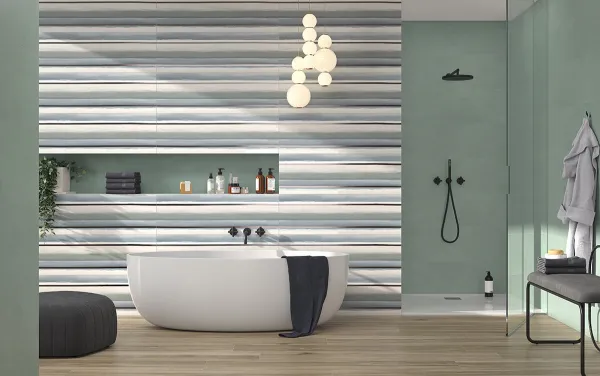 Baño con azulejos efecto cemento en tonos fríos, colección Impulse de Colorker