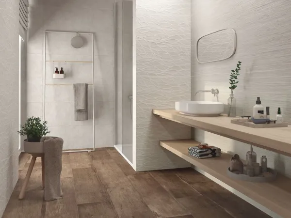 Baño con azulejos efecto cemento, colección Indiga lines de Durstone