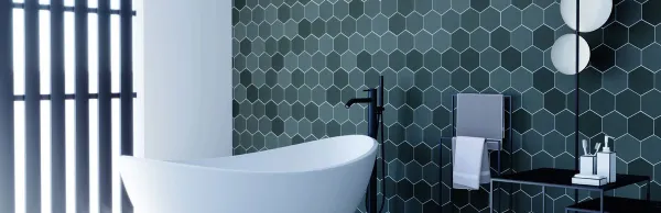 Baño con azulejos efecto cemento en tonos fríos, colección Karma de Cevica