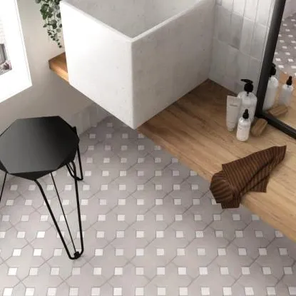 Baño con azulejos efecto cemento en tonos neutros, colección Kasbah de Equipe