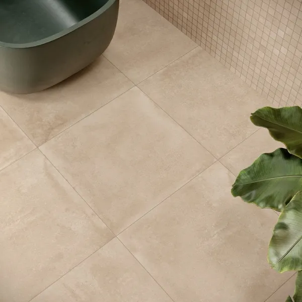 Baño con azulejos efecto cemento en tonos cálidos, colección Legacy de Love Tiles