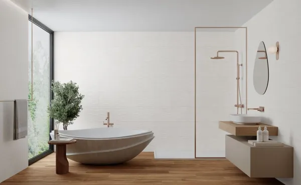 Baño con azulejos efecto cemento, colección Levin de Navarti