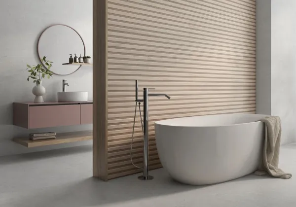 Baño con azulejos efecto cemento, colección Levin de Navarti